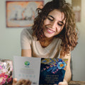 Load image into Gallery viewer, Lifestyle image(s) featuring Tree-Free’s Warm Kind Gentle card
