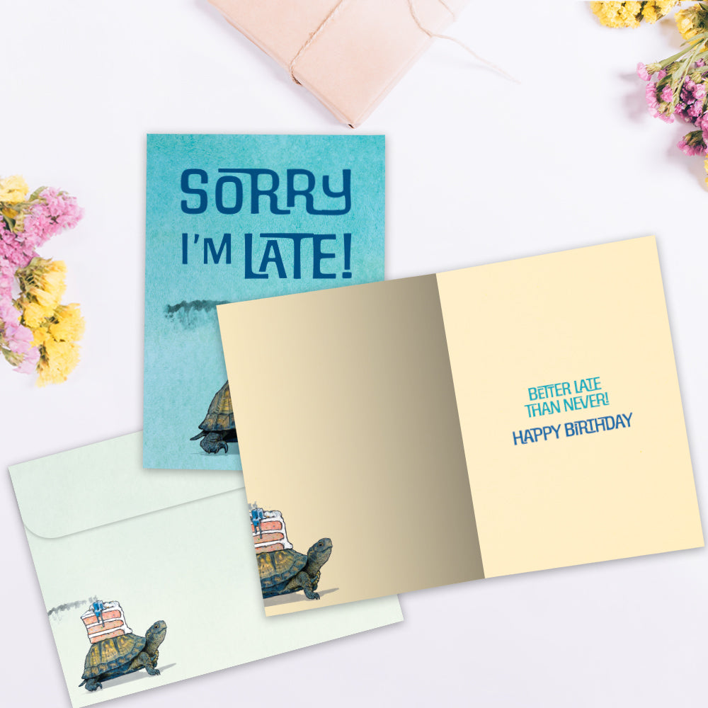 The inside of Tree-Free’s Better Late Than Never card, with the cover and envelope in the background.