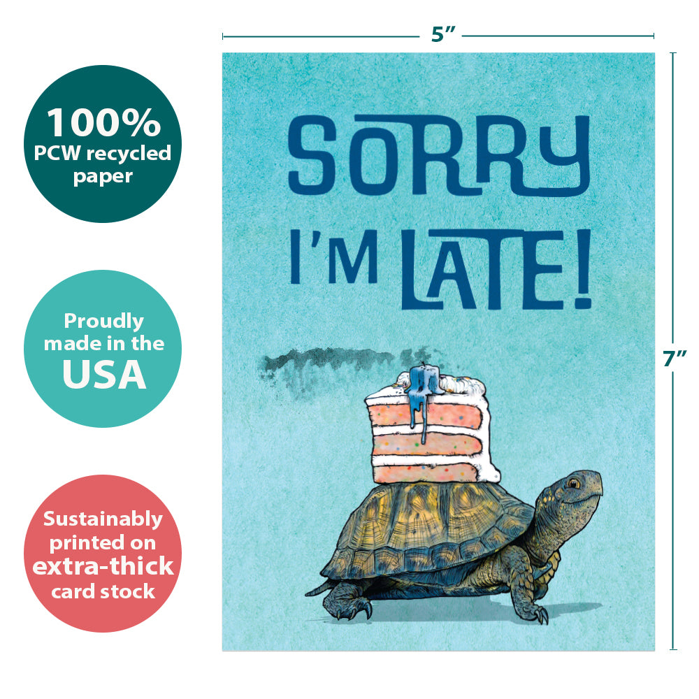 The cover of Tree-Free’s Better Late Than Never card with lines demonstrating its 5x7 dimensions, along with the following text: “100% PCW recycled paper, proudly made in the USA, sustainably printed on extra-thick card stock”