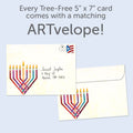 Load image into Gallery viewer, The envelope for Tree-Free’s Menorah Glow card, along with the following text: “Every Tree-Free 5x7 card comes with a matching ARTvelope!”

