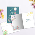 Load image into Gallery viewer, The inside of Tree-Free’s Lantern Joy card, with the cover and envelope in the background.
