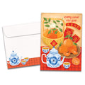 Load image into Gallery viewer, The cover of Tree-Free&#39;s Lucky Tea Set card, along with its matching envelope.
