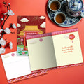 Load image into Gallery viewer, The inside of Tree-Free’s Magic Pavilion card, with the cover and envelope in the background.
