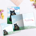 Load image into Gallery viewer, The inside of Tree-Free’s Mama Bear Birthday card, with the cover and envelope in the background.
