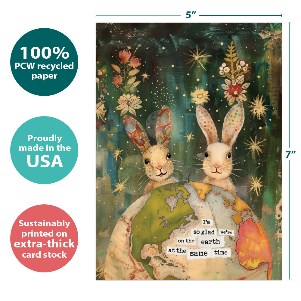 The cover of Tree-Free’s Earth Rabbits card with lines demonstrating its 5x7 dimensions, along with the following text: “100% PCW recycled paper, proudly made in the USA, sustainably printed on extra-thick card stock”