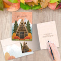 Load image into Gallery viewer, The inside of Tree-Free’s Welcome Thanksgiving card, with the cover and envelope in the background.
