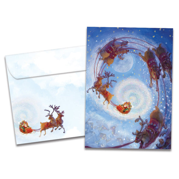 The cover of Tree-Free's Soaring Santa card, along with its matching envelope.