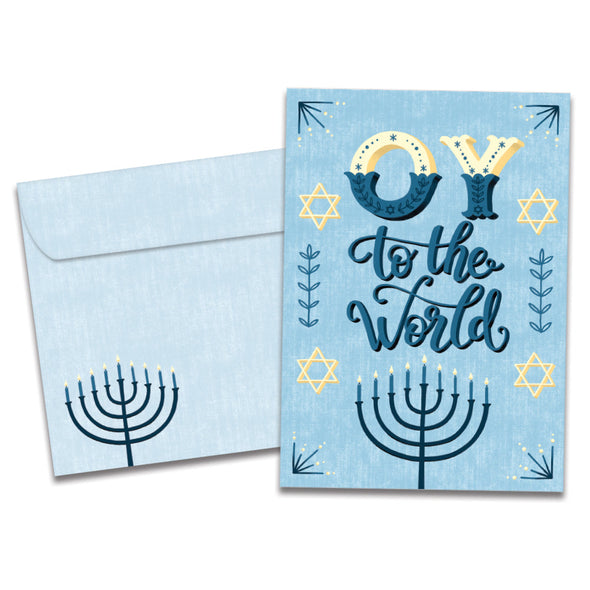 The cover of Tree-Free's Oy to the World card, along with its matching envelope.