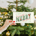 Load image into Gallery viewer, Lifestyle image(s) featuring Tree-Free&#39;s Merry Little Christmas Drawn card
