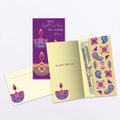 Load image into Gallery viewer, The inside of Tree-Free’s Light and Love card, with the cover and envelope in the background.
