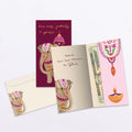 Load image into Gallery viewer, The inside of Tree-Free’s From Our Family card, with the cover and envelope in the background.
