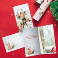 Load image into Gallery viewer, The inside of Tree-Free’s Piled Wild Watercolor card, with the cover and envelope in the background.
