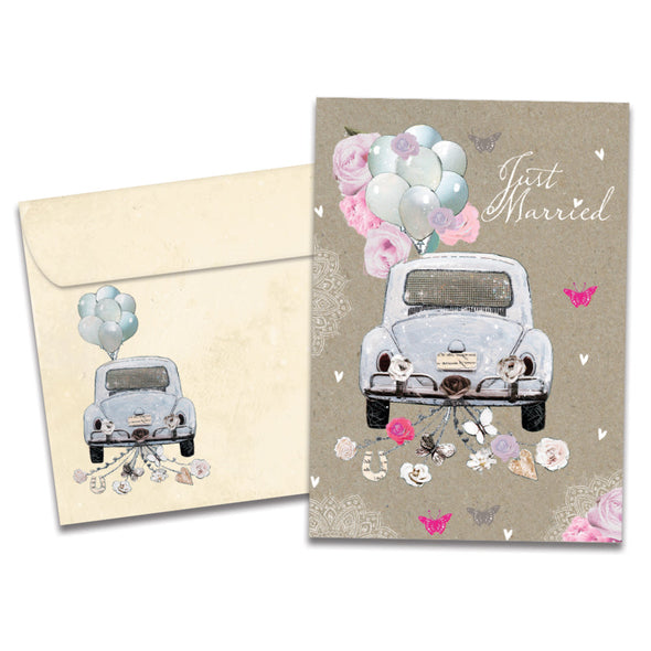 Cover of Just Married Wedding card (featuring script text next to artwork of a car surrounded by balloons, flowers, butterflies, and hearts) and its matching envelope