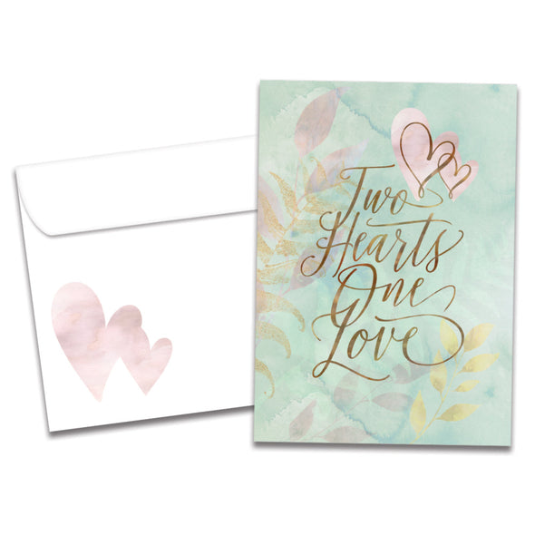 Cover of Two Hearts Wedding card (featuring script text below artwork of two interlinked hearts) and its matching envelope