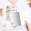 Load image into Gallery viewer, The inside of Tree-Free’s Time to Celebrate card, with the cover and envelope in the background.
